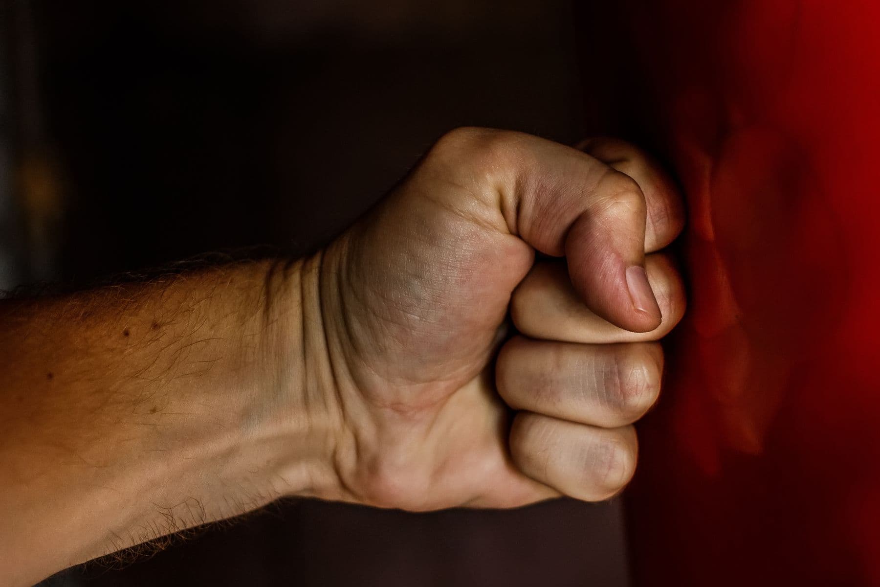 Clenched fist showing tension and anger
