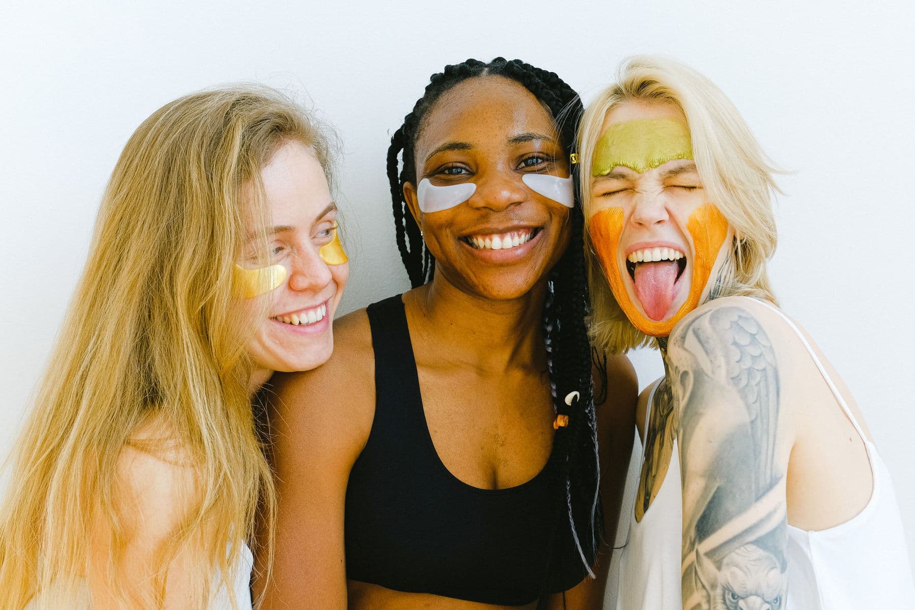 Group of friends laughing together, relaxed and at ease