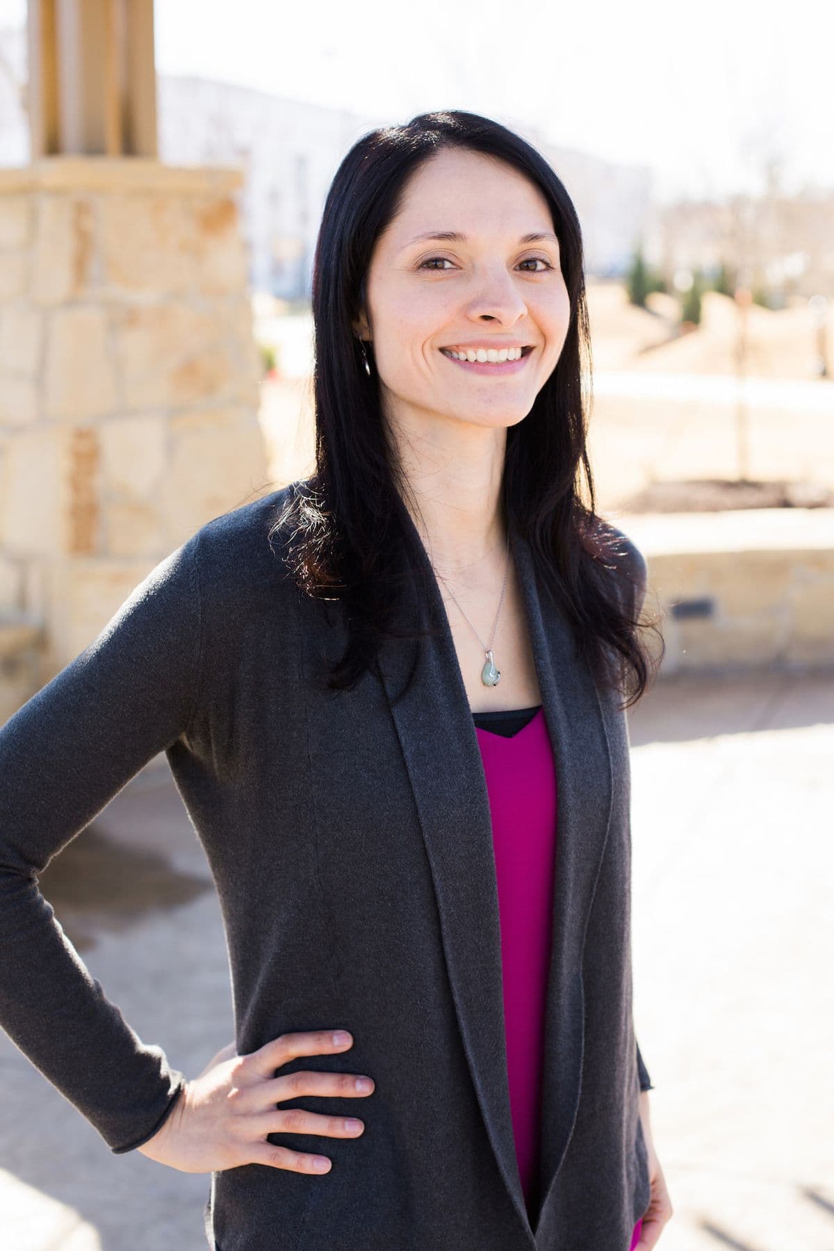 Shameela Keshavjee, Licensed Marriage and Family Therapist, standing outdoors and smiling